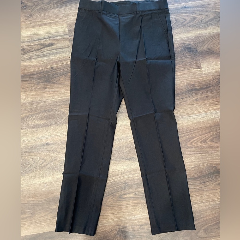 Rafaella Women’s size 12 black stretch dress pants for the office. Pockets. NWT!